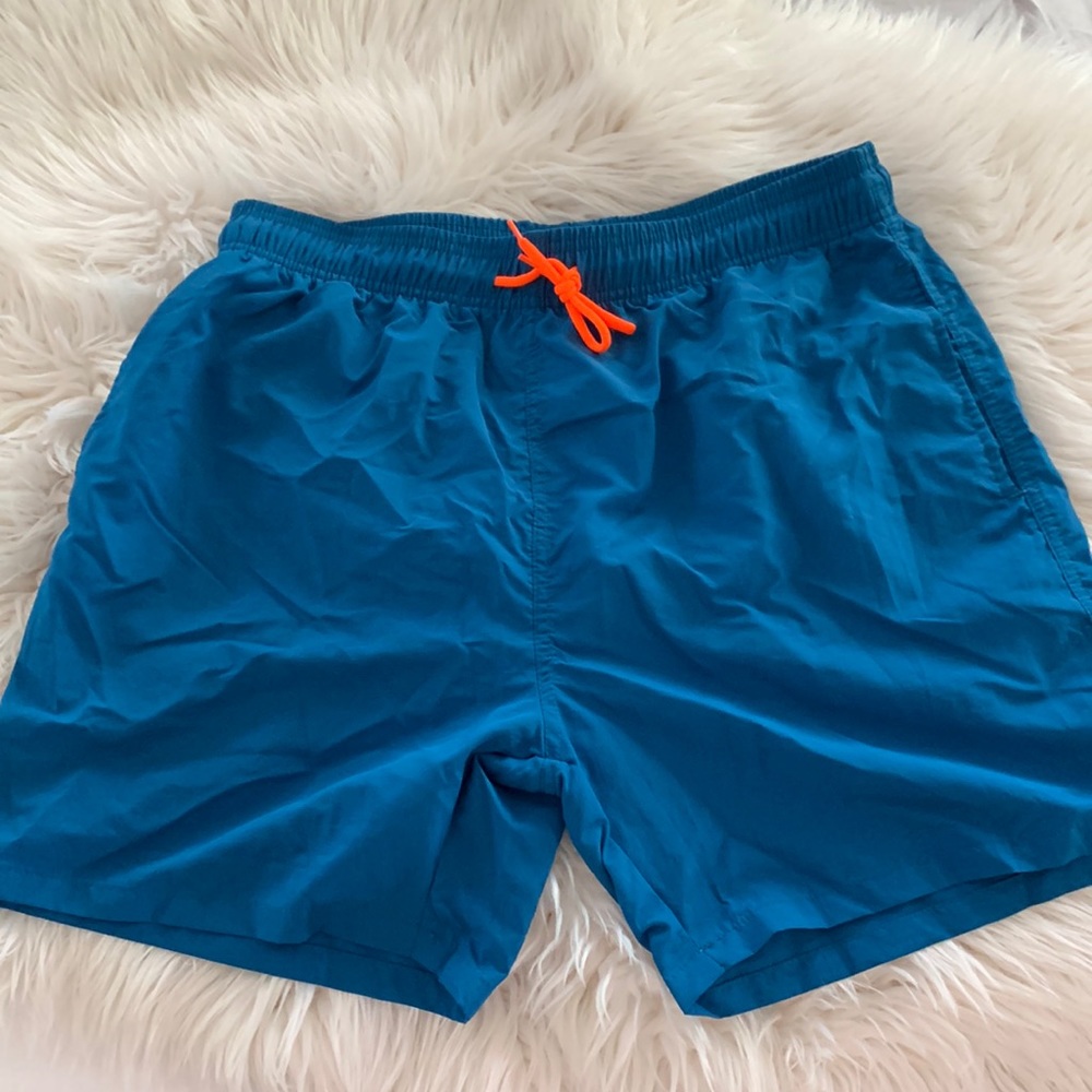 Peacock Blue Men’s swim trunks NWOT